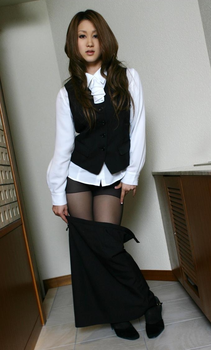 Brunette Asian Schoolgirl wearing Black Sheer Pantyhose and Taking Skirt Off